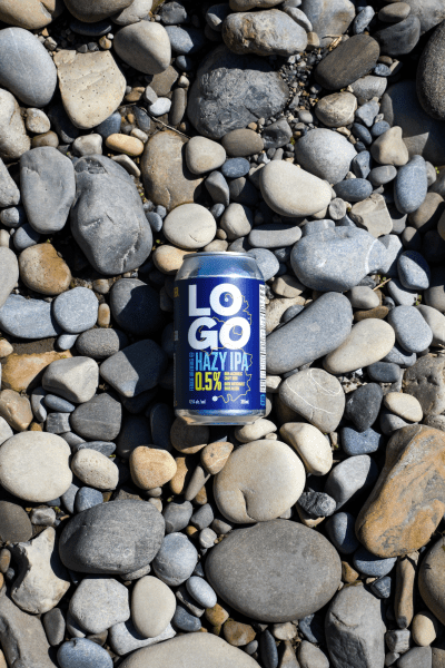 A can of LOGO Hazy IPA on rocks