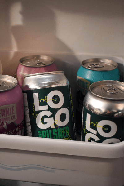 A can of LOGO Pilsner in a fridge